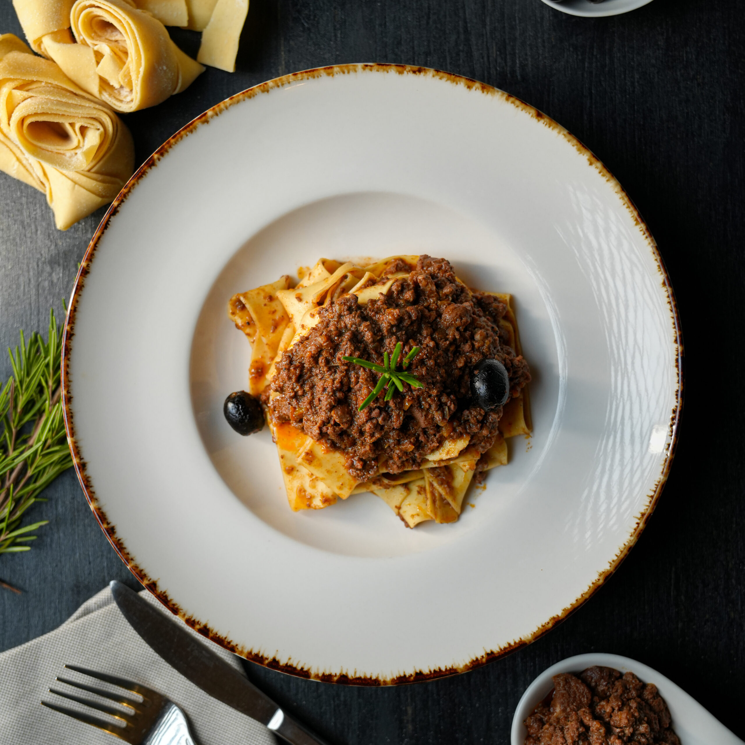 Pappardelle al sugo di cinghiale con olive nere